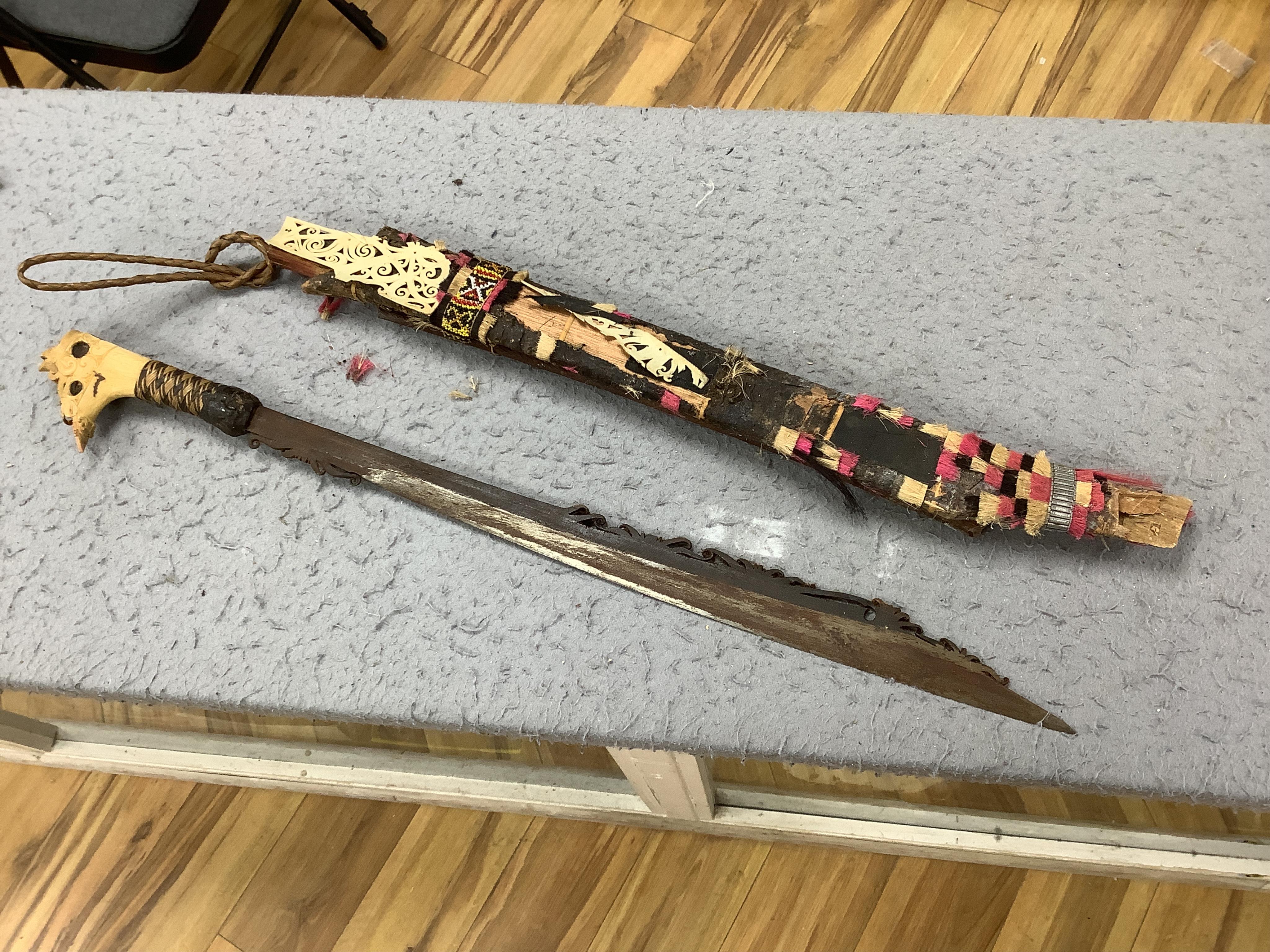 A group of assorted bladed weapons including a kukri, a jambiya, etc, longest 84cm